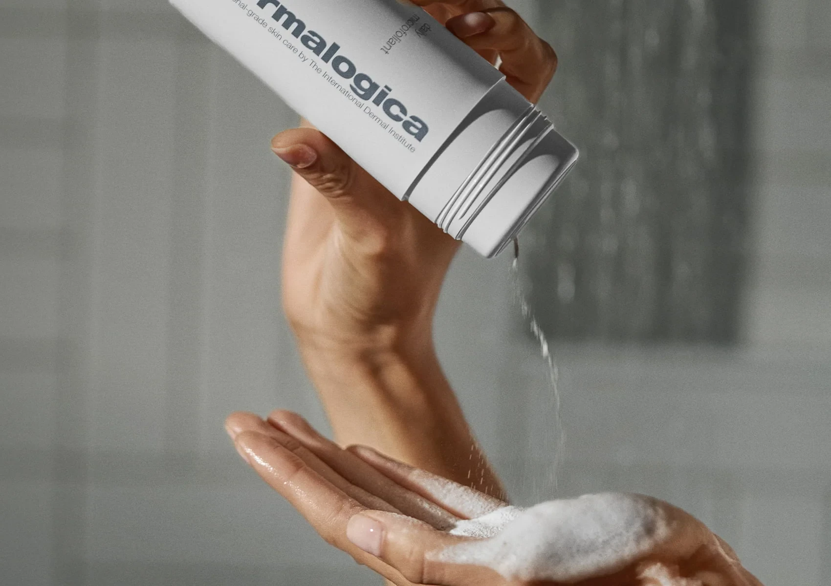 daily microfoliant being dispensed into hands